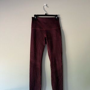 lulu lemon leggings, slightly crop, purple and black together